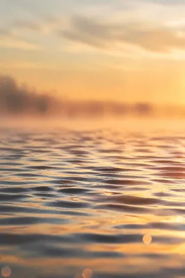 Golden Dawn Reflections on Calm Water