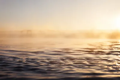 Golden Dawn Reflections on Calm Water