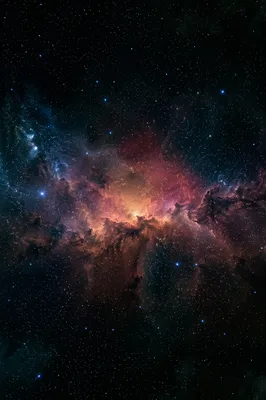 Glowing Nebula Across Dark Star Field