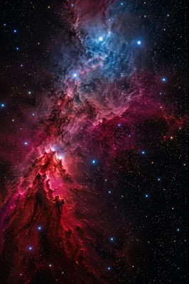 Crimson Nebula Over Dark Star Field
