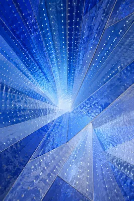 Blue Geometric Light Pattern Background