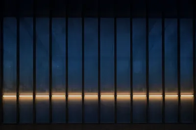 Black Metal Slats Blue Glass Wall