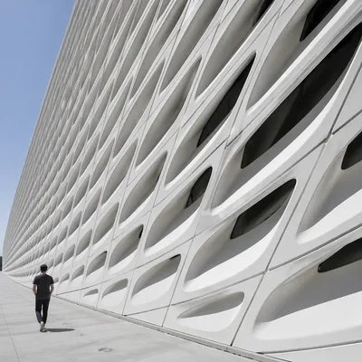 Minimalist Geometric Facade With Futuristic Walkway