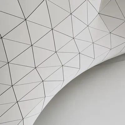 Minimalist Geometric Lines on Curved White Surface