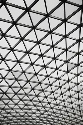 Minimalist Glass Canopy Triangular Geometry