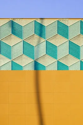 Modern Geometric Ochre Facade Background