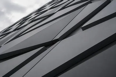 Modern Geometric Metal Facade Background