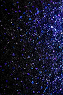 Festive Violet Glitter Background on Black