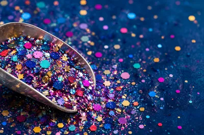 Festive Multicolor Glitter Scoop Background