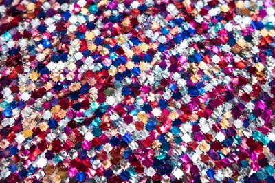 Festive Jewel Tone Confetti Sparkle Background