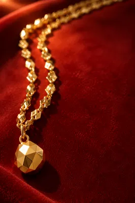 Elegant Gold Chain on Crimson Velvet