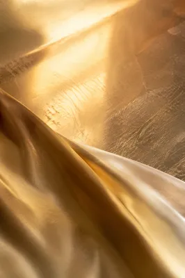Elegant Gold Metallic Fabric Background