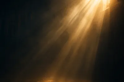 Golden Light Rays in Reverent Darkness