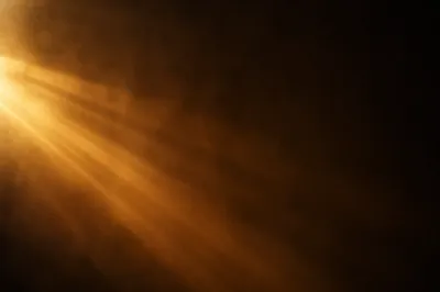 Golden Light Rays in Smoky Darkness