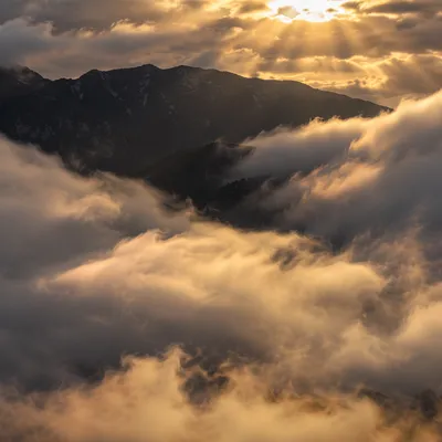 Golden Light Rays Through Heavenly Clouds