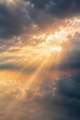 Golden Heavenly Light Rays Through Clouds