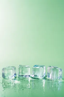 Fresh Green Background with Melting Ice Cubes