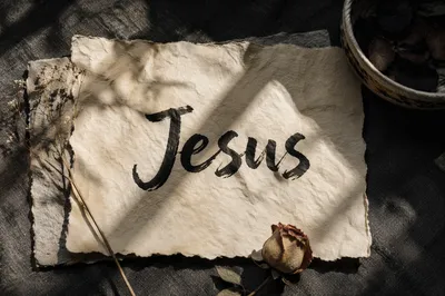 Elegant Jesus Name Calligraphy Background