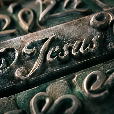 Elegant Jesus Name Calligraphy Background