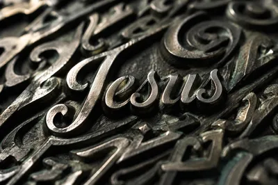 Elegant Jesus Name Calligraphy Metal Background
