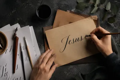 Elegant Jesus Calligraphy Workspace Background