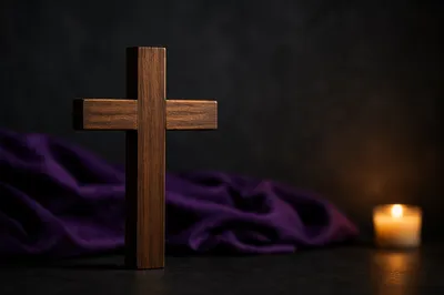 Wooden Cross with Purple Draped Background