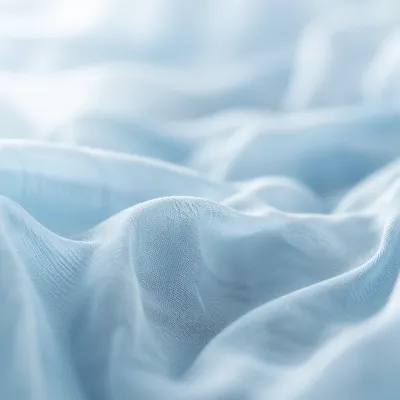 Soft Light Blue Draped Fabric Background