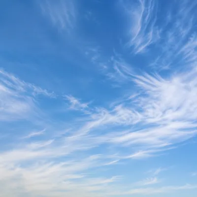 Soft Light Blue Sky with Cirrus Clouds