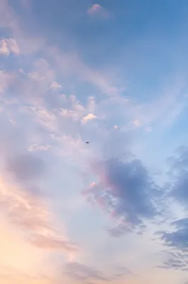 Soft Light Blue Sky with Serene Clouds