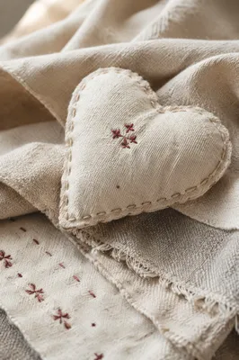 Neutral Cream Linen Heart Textile Background