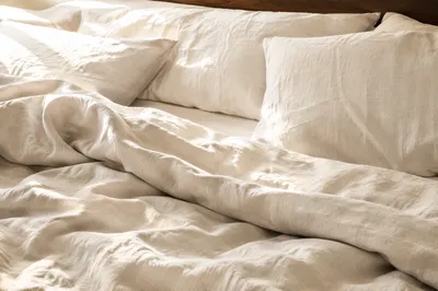 Neutral Cream Linen Bedding Texture Background