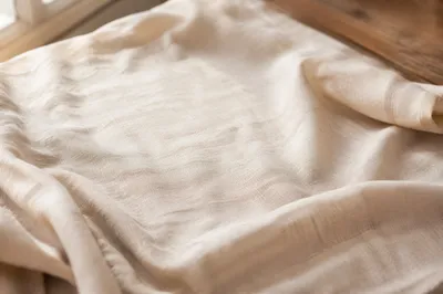 Neutral Cream Linen on Wooden Table