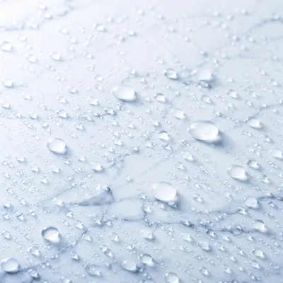 Clean White Marble With Water Droplets