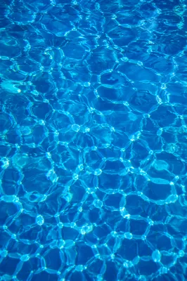 Shimmering Blue Pool Water Background