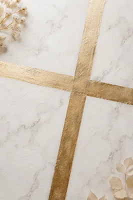 White Marble Background with Gold Cross Accent