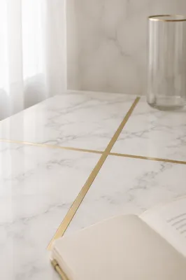 White Marble Background with Gold Cross Accent