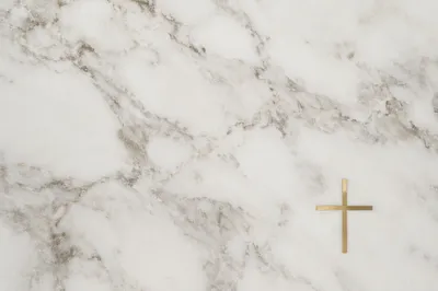 White Marble Background with Gold Cross