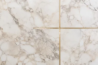 White Marble Background with Gold Cross