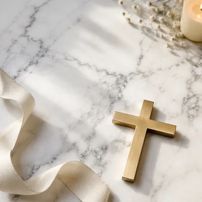 White Marble Background with Gold Cross Accent