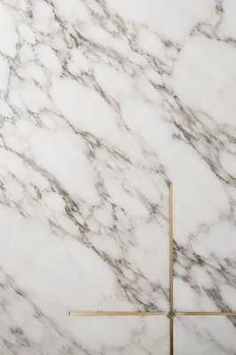 White Marble Background with Gold Cross