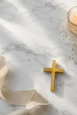 White Marble Background with Gold Cross