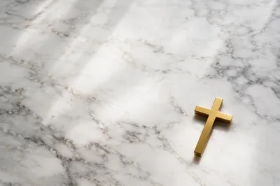 White Marble Background with Gold Cross