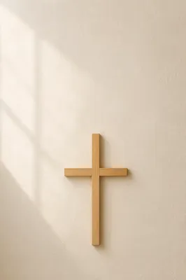 Minimalist Wooden Cross on Clean Wall
