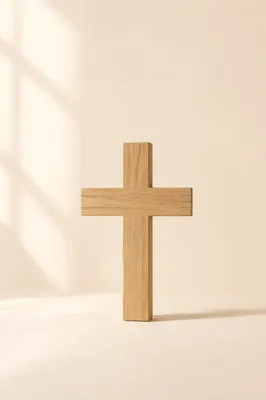 Minimalist Wooden Cross on Warm Background
