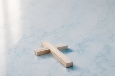 Minimal Wooden Cross on Clean Background