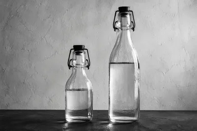 Minimal Glass Bottles on Gray Background