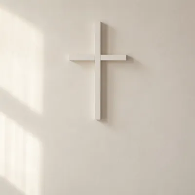 Minimalist White Cross on Cream Wall