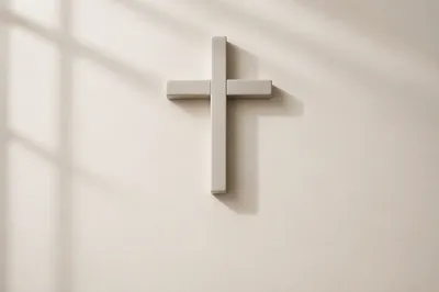 Minimalist Ceramic Cross on Warm Background