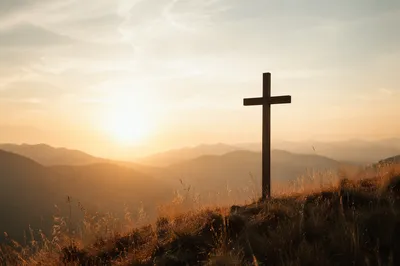 Minimal Wooden Cross on Dawn Hillside
