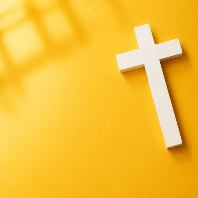 Minimalist White Cross on Golden Background